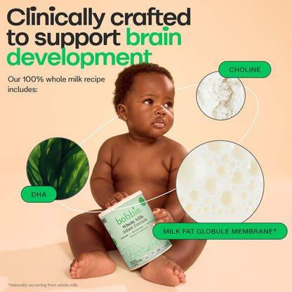 Baby holding a Bobbie Whole Milk Infant Formula can with text about brain development and ingredients on a beige background.