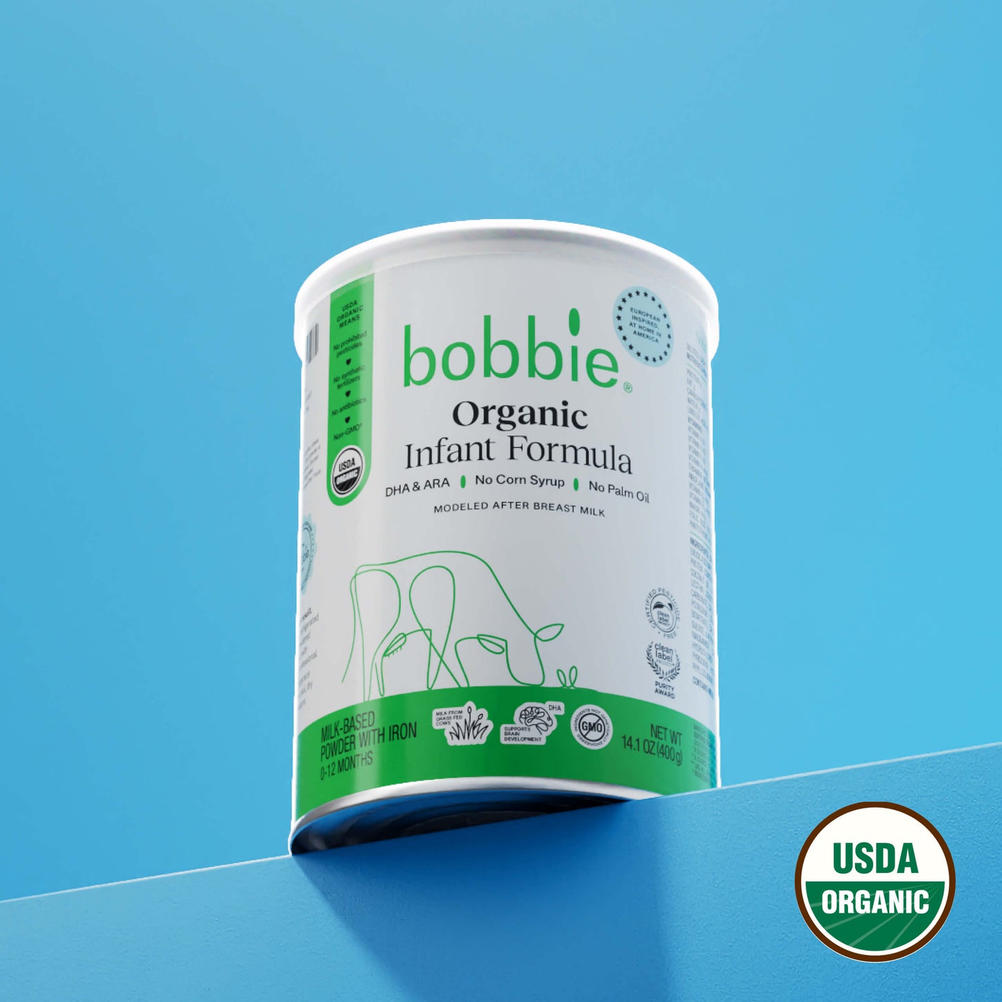 Bobbie Organic Infant Formula container on a blue background